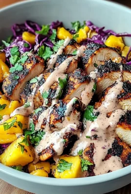 Jerk Chicken & Mango Slaw Bowls with Honey Lime Cream